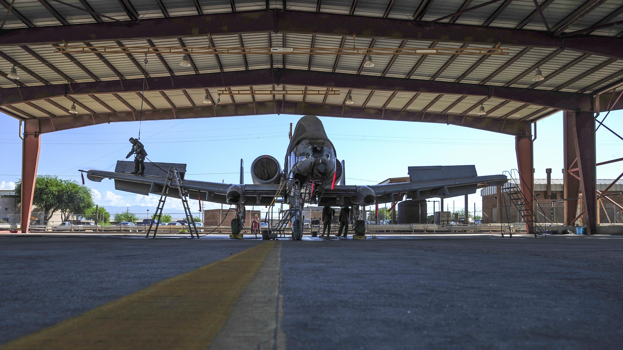 A U.S. Air Force A-10C Thunderbolt II rests in a wash rack at Davis-Monthan Air Force Base, Ariz., July 25, 2017. The A-10 recently returned from a deployment to Turkey in support of Combined Joint Task Force – Operation Inherent Resolve. (U.S. Air Force photo by Airman 1st Class Michael X. Beyer)