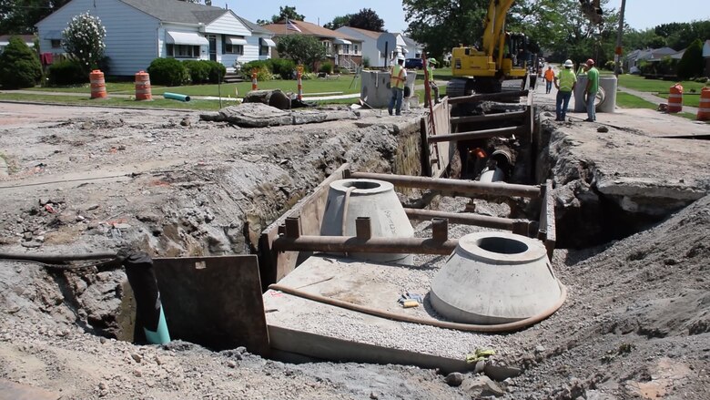 Contractors working on an environmental infrastructure project in Parma, Ohio on July 19, 2017.