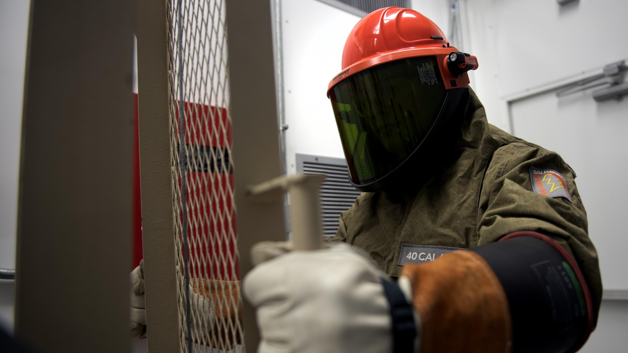 Airman 1st Class Gavin Verhoeven, an electrician with the 87th Civil Engineer Squadron, performs preventative maintenance at one of the power substations at Joint Base McGuire-Dix-Lakehurst, New Jersey, July 26, 2017. Electricians at the Joint Base recently responded to an explosion at the main power station on the McGuire-side of the installation, and are working on a permanent solution.