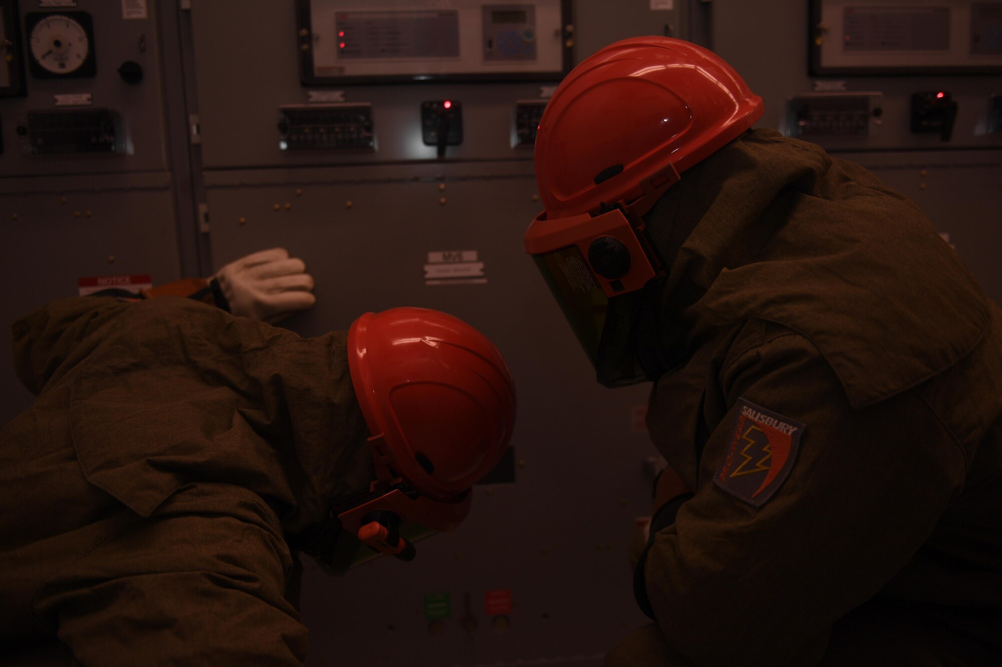 Airmen 1st Class Gavin Verhoeven and Senior Airman Parker Reese, electricians with the 87th Civil Engineer Squadron, perform preventative maintenance at a power substation on the McGuire-side of Joint Base McGuire-Dix-Lakehurst, New Jersey, July 26, 2017. Due to the risky nature of their career field, the Airmen electricians are required to work in pairs. 