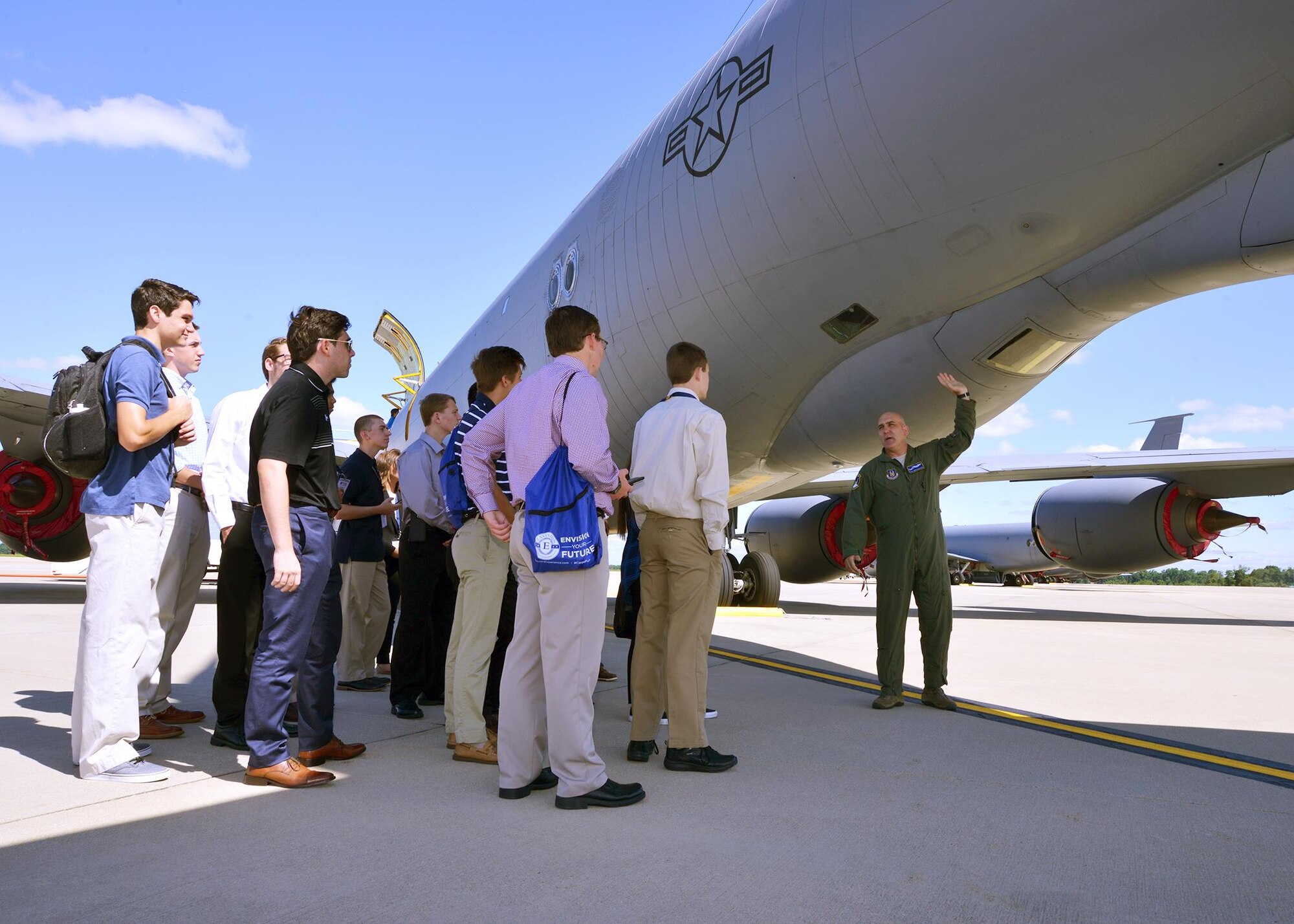 Tech. Sgt. Chris McAllister, 756th Air Refueling Squadron boom operator, speaks to high school students during a career camp tour on the Joint Base Andrews, Maryland, flightline July 25, 2017. The students visited the 459th Air Refueling Wing to learn about careers available to them in the Air Force Reserve. (U.S. Air Force photo/Tech. Sgt. Erica Knight)