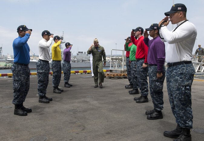 170725-N-LI768-009
SAN DIEGO (July 25, 2017) Commander, Naval Air Forces Vice Adm. Mike Shoemaker returns honors to sideboys as he arrives aboard the amphibious assault ship USS Makin Island (LHD 8).  Shoemaker presented the Admiral James H. Flatley Memorial Award to the Makin Island crew for excellence in aviation safety.  Makin Island is homeported in San Diego, and is preparing for an upcoming maintenance availability. (U.S. Navy photo by Mass Communication Specialist 2nd Class Devin M. Langer)