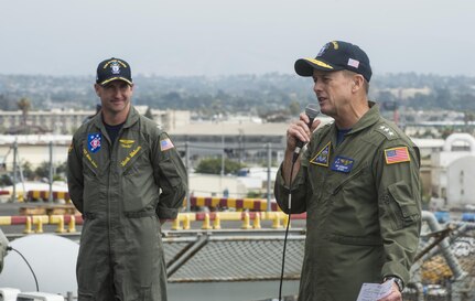 170725-N-LI768-146
SAN DIEGO (July 25, 2017) Commander, Naval Air Forces Vice Adm. Mike Shoemaker, right, delivers remarks during the presentation of the Admiral James H. Flatley Memorial Award to the crew of the amphibious assault ship USS Makin Island (LHD 8).  Makin Island and the 11th Marine Expeditionary Unit received the award for excellence in aviation safety.  Makin Island is homeported in San Diego, and is preparing for an upcoming maintenance availability. (U.S. Navy photo by Mass Communication Specialist 2nd Class Devin M. Langer)