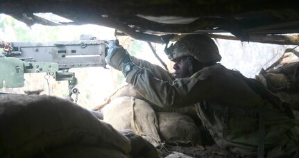 Pv2. Roujoeh Blackwood, an infantryman assigned to Alpha Company, 1st Battalion, 69th Infantry Regiment of the New York Army National Guard, mans an M2 .50 Caliber Machine Gun at Shoalwater Bay, Queensland, Australia, during exercise Talisman Saber, July 14, 2017. During the exercise Soldiers from the 69th served as the opposing force in a week-long war game against an active duty Australian Defense Force brigade. (U.S. Army National Guard photo by Sgt. Alexander Rector)