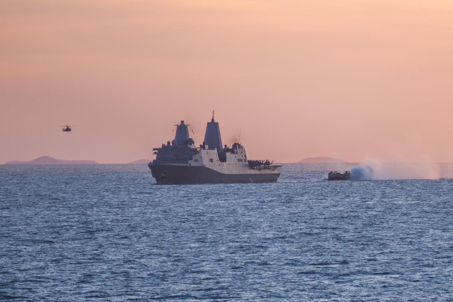 CORAL SEA (July 24, 2017) A landing craft air cushion (LCAC) closes-in to enter the well deck of the amphibious transport dock USS Green Bay (LPD 20) to transport equipment from shore after the completion of Talisman Saber 2017. Talisman Saber is a biennial U.S.-Australia bilateral exercise held off the coast of Australia meant to achieve interoperability and strengthen the U.S.-Australia alliance. (U.S. Navy photo by Mass Communication Specialist 3rd Class Jonathan Clay/Released)