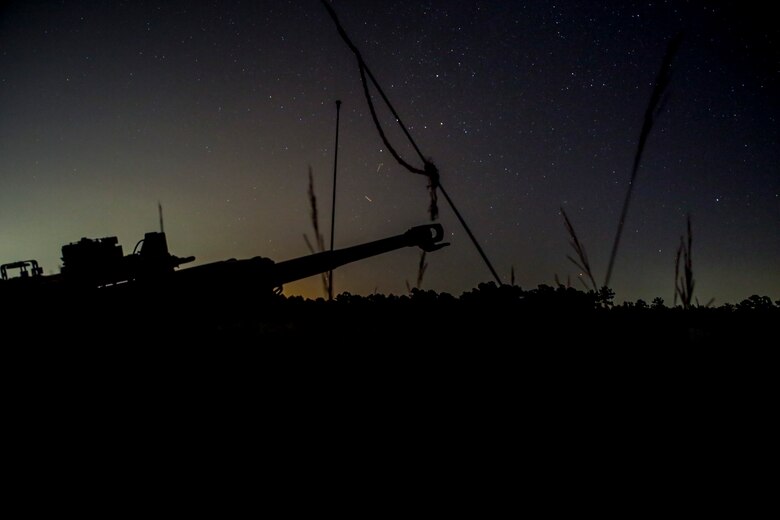 An M777A2 Howitzer stands ready to conduct night operations during a live-fire range at Camp Lejeune, N.C., July 26, 2017. The purpose of this field operation is to test and improve the unit’s capabilities by putting the Marines into a simulated combat environment. The Exercise was conducted by 1st Battalion, 10th Marine Regiment. (U.S. Marine Corps photo by Lance Cpl. Holly Pernell)
