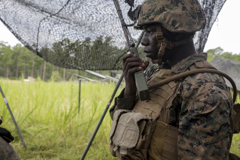 A Marine receives a call for fire during a live-fire range at Camp Lejeune, N.C., July 26, 2017. The purpose of this field operation is to test and improve the unit’s capabilities by putting the Marines into a simulated combat environment. The Marine is with 1st Battalion, 10th Marine Regiment. (U.S. Marine Corps photo by Lance Cpl. Holly Pernell) 