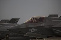 A pilot with Marine Fighter Attack Squadron (VMFA) 211 “Wake Island Avengers,” 3rd Marine Aircraft Wing, prepares to exit an F-35B Lightning II after landing at Nellis Air Force Base, Nev., July 10. A total of 10 F-35B Lightning IIs and 250 Marines with VMFA-211 participated in Red Flag 17-3, a realistic combat training exercise hosted by the U.S. Air Force, to assess the squadron’s ability to deploy and support contingency operations using the F-35B. (U.S. Marine Corps photo by Sgt. Lillian Stephens/Released)