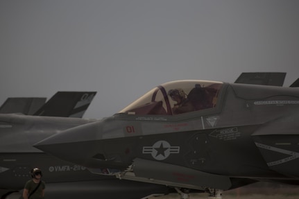A pilot with Marine Fighter Attack Squadron (VMFA) 211 “Wake Island Avengers,” 3rd Marine Aircraft Wing, prepares to exit an F-35B Lightning II after landing at Nellis Air Force Base, Nev., July 10. A total of 10 F-35B Lightning IIs and 250 Marines with VMFA-211 participated in Red Flag 17-3, a realistic combat training exercise hosted by the U.S. Air Force, to assess the squadron’s ability to deploy and support contingency operations using the F-35B. (U.S. Marine Corps photo by Sgt. Lillian Stephens/Released)
