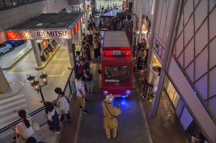 Guests bustle around Kidzania in Kobe, Japan, July 26, 2017. Kidzania is themed as a child-sized replica of a real city including buildings, shops and theaters, as well as vehicles and pedestrians moving along its streets. Marine Corps Air Station Iwakuni residents visited the theme park as part of a Youth and Teen Center trip. (U.S. Marine Corps photo by Lance Cpl. Carlos Jimenez)