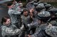 U.S. Airmen assigned to the 86th Security Forces Squadron hold their position during confrontational management training at the 86th SFS training section on Ramstein Air Base, Germany, July 25, 2017. At the end of their training, the security forces members had to use the techniques they learned to keep individuals from getting through their line of defense. (U.S. Air Force photo by Senior Airman Devin Boyer)