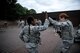 U.S. Air Force Senior Airman Khayla McCoy and U.S. Air Force Airman 1st Class Hanna Pooley, 86th Security Forces members, exchange a high five during confrontational management training at the 86th SFS training section on Ramstein Air Base, Germany, July 25, 2017. McCoy and Pooley practiced detaining each other with flex cuffs, a form of physical restraint for hands made from plastic. (U.S. Air Force photo by Senior Airman Devin Boyer)
