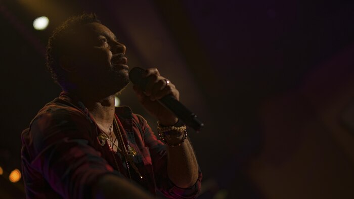 Orville Burrell, better known as “Shaggy,” a musical artist and Marine Corps veteran, sings out to his fans during a live concert at Marine Corps Air Station Iwakuni, Japan, July 26, 2017. Shaggy sang a variety of his hit songs including “Boombastic,” “It Wasn’t Me” and “Oh Carolina.” The concert was part of an Armed Forces Entertainment tour that included three military installations across Japan. (U.S. Marine Corps photo by Cpl. Donato Maffin)