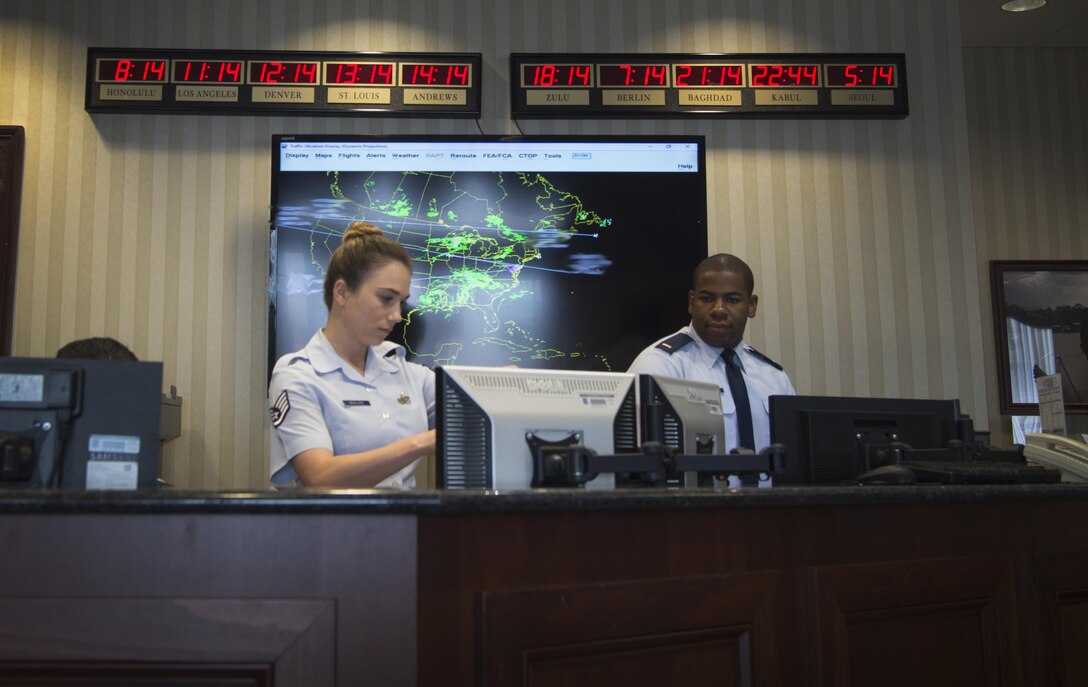 Staff Sgt. Katy McGlone, 89th Airlift Wing flight line protocol NCO in charge and 2nd Lt. Stephan Jenkins, 89th Airlift Wing flight line protocol officer, prepare for a distinguished visitors arrival at Joint Base Andrews, Md., June 22, 2017. These Airmen directly support the president, vice president, first lady, secretary of defense, secretary of state, chairman of the joint Chiefs of Staff, and foreign dignitaries. 