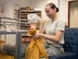 U.S. Air Force Airman 1st Class Alesha Franklin, 86th Mission Support Group Communications Squadron North Side Post Office postal specialist, prepares a bag to sort official mail on Ramstein Air Base, Germany, July 27, 2017. The North Side Post Office, the largest post office in the Department of Defense, employs 53 Airmen to support the morale of roughly 30,000 personnel and families by giving them a convenient way to receive packages from home and abroad. (U.S. Air Force photo by Senior Airman Elizabeth Baker)