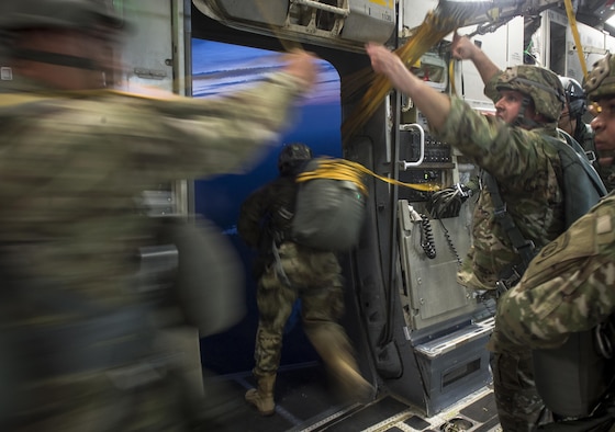 Soldiers of the 82nd Airborne Division conduct a static line jump out of a C-17 Globemaster III during exercise Panther Storm at Fort Bragg, N.C., July 24, 2017. The deployment readiness exercise tests the division's ability to rapidly deploy its global response force anywhere in the world within a short notice. (U.S. Air Force photo/Staff Sgt. Andrew Lee)