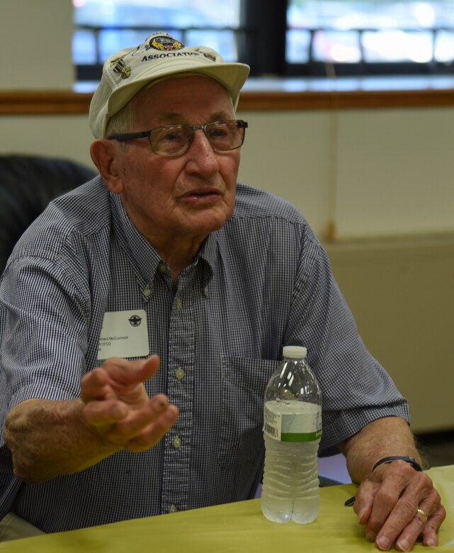 Richard McCormick, World War II veteran, tells a story during a tour of the 457th Airlift Squadron at Joint Base Andrews, Md., June 30, 2017. McCormick was a central fire control operator with the 457th Bombardment Squadron stationed in the Pacific during WWII.  The tour was part of the 457th AS’s 75th anniversary celebration.  (U.S. Air Force Photo by Airman 1st Class Rustie Kramer) 