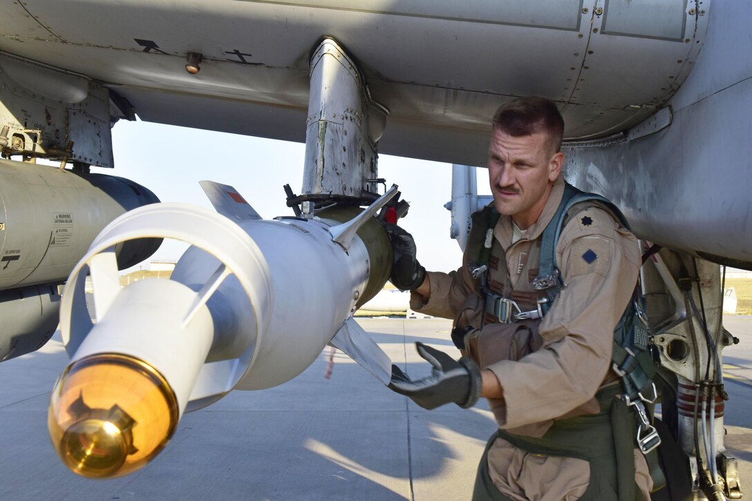 Air Force Lt. Col. Ben Rudolphi, the commander of the 407th Expeditionary Operation Support Squadron, conducts a preflight munitions check on his A-10 Thunderbolt II at Incirlik Air Base, Turkey, July 11, 2017. Rudolphi has played a dual role in Operation Inherent Resolve, serving as a squadron commander and flying A-10s in the fight against the Islamic State of Iraq and Syria with the 477th Air Expeditionary Group. Air Force photo by Senior Airman Ramon A. Adelan