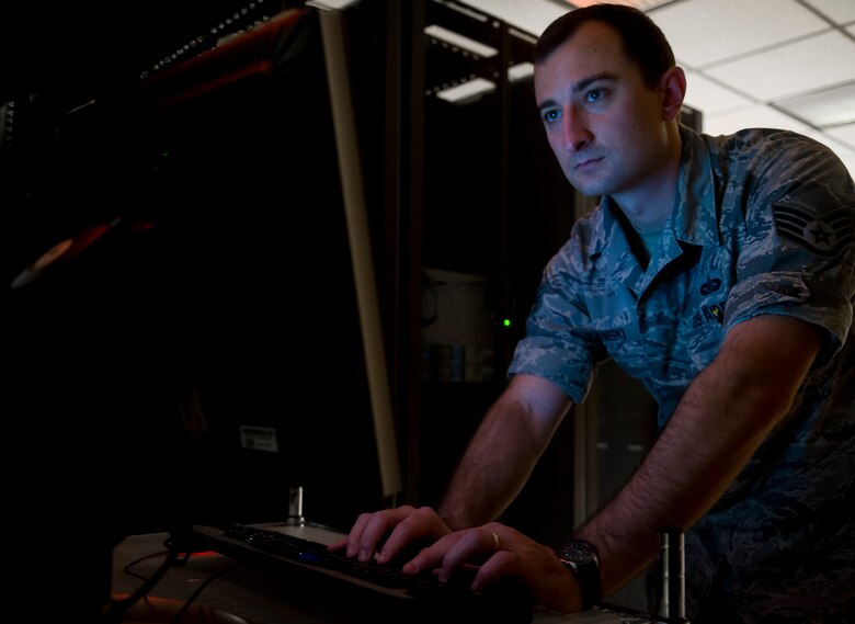 Staff Sgt. Kacper Sovinski, Geospatial Intelligence Analysis Squadron research and development project manager, upgrades data drives for the airborne sensor servers July 17, 2017, at the National Air and Space Intelligence Center. Sovinski was recently named one of the 12 Outstanding Airmen of the Year for numerous achievements, some of which include leading a four-member team to develop the Air Force’s first laser sensor data analysis training program. He also executed a two-week study and calibration test to maximize the capabilities of a $3 million airborne asset. (U.S. Air Force photo/Senior Airman Jonathan Stefanko) 