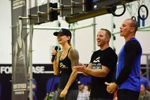 Alpha Warrior professionals talk to competitors before Alpha Warrior Challenge at Whiteman Air Force Base, Mo., July 22, 2017. They were available to give tips and demonstrate how they would take on the obstacles.  