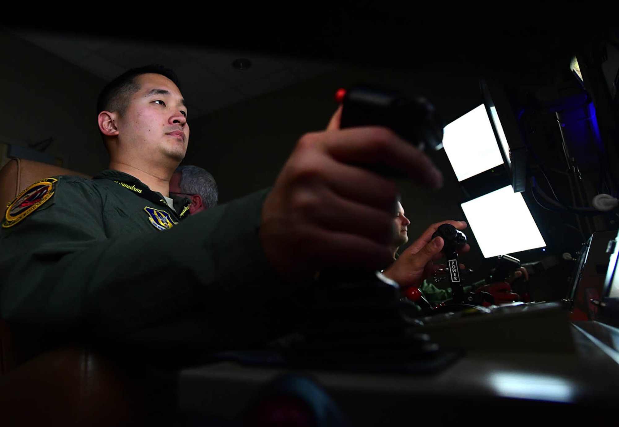 Master Sgt. Johann, 926th Wing, tracks a simulated
enemy during a training mission July 7, 2017. As a sensor operator, Johann operates the multi-spectral targeting system of an MQ-9 for reconnaissance and providing terminal guidance for weapons. Johann was selected as one of the Air Force's 12 Outstanding Airmen of the Year. (U.S. Air Force photo/Senior Airman Christian Clausen)
