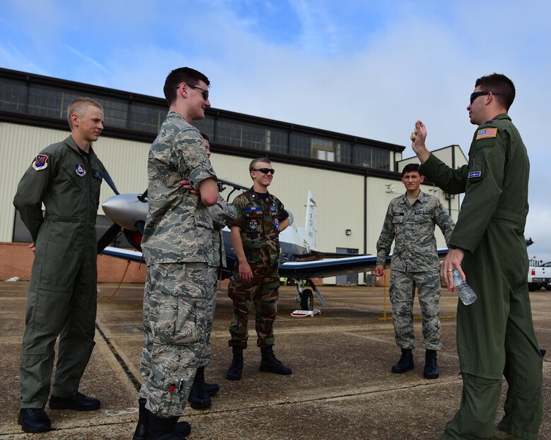 Capt. Whitt Hollis, 41st Flying Training Squadron Class Flight Commander, speaks to Civil Air Patrol cadets July 25, 2017, on Columbus Air Force Base, Mississippi. The cadets saw static displays of all three Columbus AFB aircraft and learned about the process of becoming an Air Force pilot. (U.S. Air Force photo by Elizabeth Owens)