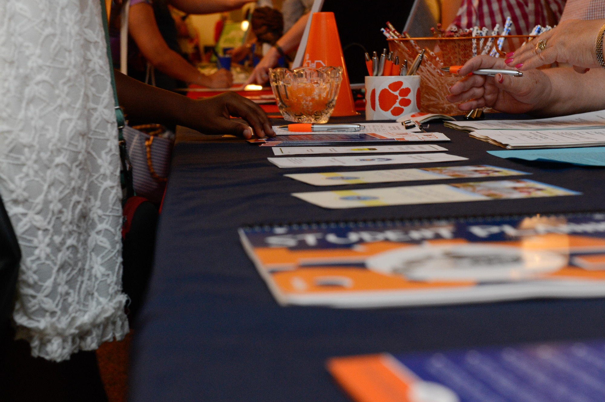 School stations provided families information on local schools to send their children to at the Back to School Night hosted by 2nd Force Support Squadron at Barksdale Air Force Base, La., July 24, 2017. Kindergarten through 12th grade are eligible to choose their school through the new School of Choice Initiative. (U.S. Air Force Photo/Airman 1st Class Sydney Bennett)
