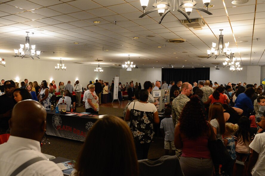 Military families speak to local schools in person at the Back to School Night hosted by the 2nd Force Support Squadron at Barksdale Air Force Base, La., July 24, 2017. More than 300 military members and over 110 school administrators attended the event. (U.S. Air Force Photo/Airman 1st Class Sydney Bennett)