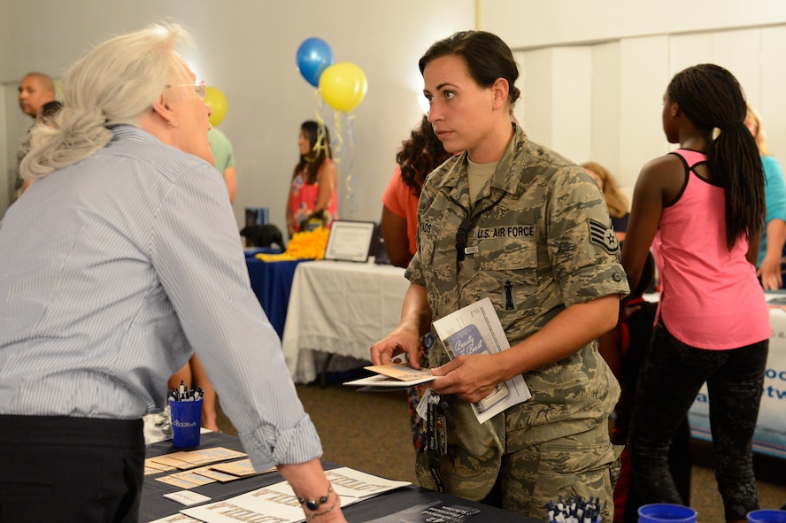 Military families get their questions answered directly from schools at the Back to School Night hosted by the 2nd Force Support Squadron at Barksdale Air Force Base, La., July 24, 2017. The event hosted multiple schools from the Bossier City and Caddo Parish school districts in order to provide families with all the tools and information they need to make a decision on where to send their children to school. (U.S. Air Force Photo/Airman 1st Class Sydney Bennett)