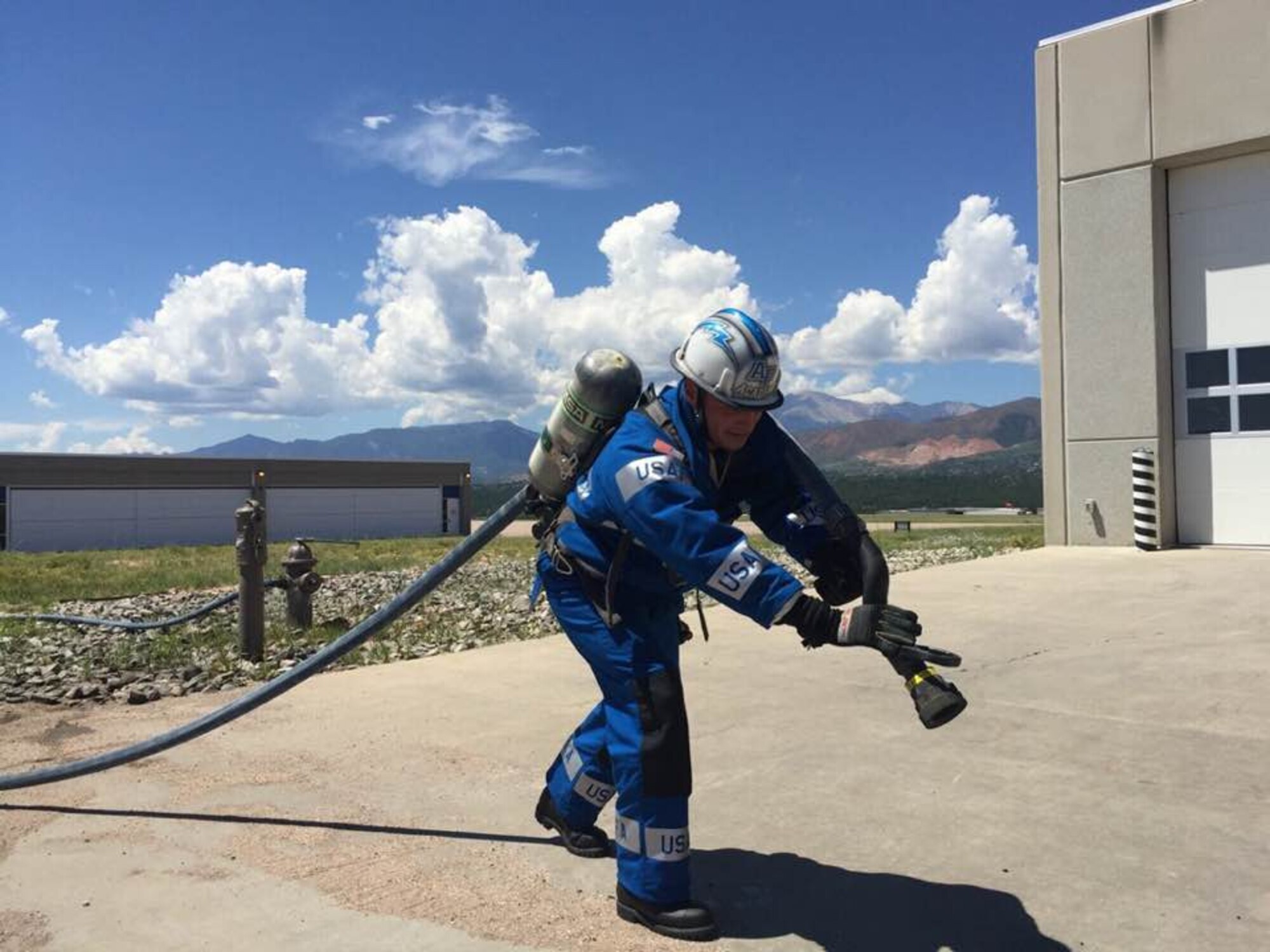 This 10th Civil Engineering Squadron firefighter and others at the U.S. Air Force Academy are scheduled to complete in the regional Firefighter Combat Challenge, July 28-29 in Longmont, Colorado, to qualify for the World Challenge championship in October. (10th CES Fire Department)