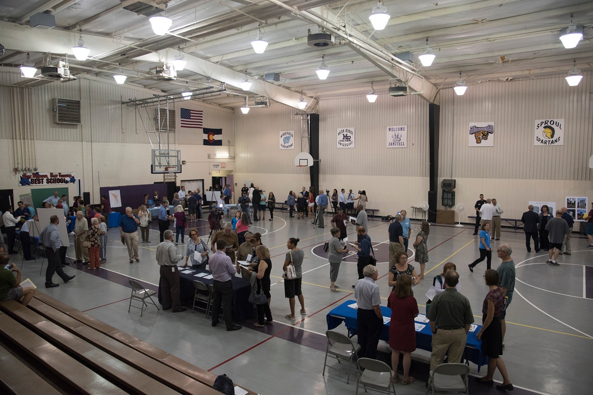 FOUNTAIN, Colo. – Colorado Springs community members attend an open house to meet with local state, federal and military members at Janitell Junior High School, July 25, 2017, Fountain, Colo. The Air Force Civil Engineer Center and 21st Space Wing leadership attended to answer community members’ questions on the site inspection report released earlier that day on the perfluorooctane sulfonate and perfluorooctanoic acid contamination. (U.S. Air Force photo by Staff Sgt. Tiffany Lundberg)