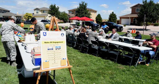 50th Mission Support Group members enjoy lunch during a resiliency picnic at Schriever Air Force Base, Colorado, Wednesday, July 26, 2017. The picnic was held to build Airmen’s resiliency and establish connections with the Chaplain staff. (U.S. Air Force photo/Senior Airman Arielle Vasquez)