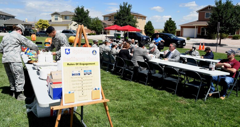 50th Mission Support Group members enjoy lunch during a resiliency picnic at Schriever Air Force Base, Colorado, Wednesday, July 26, 2017. The picnic was held to build Airmen’s resiliency and establish connections with the Chaplain staff. (U.S. Air Force photo/Senior Airman Arielle Vasquez)