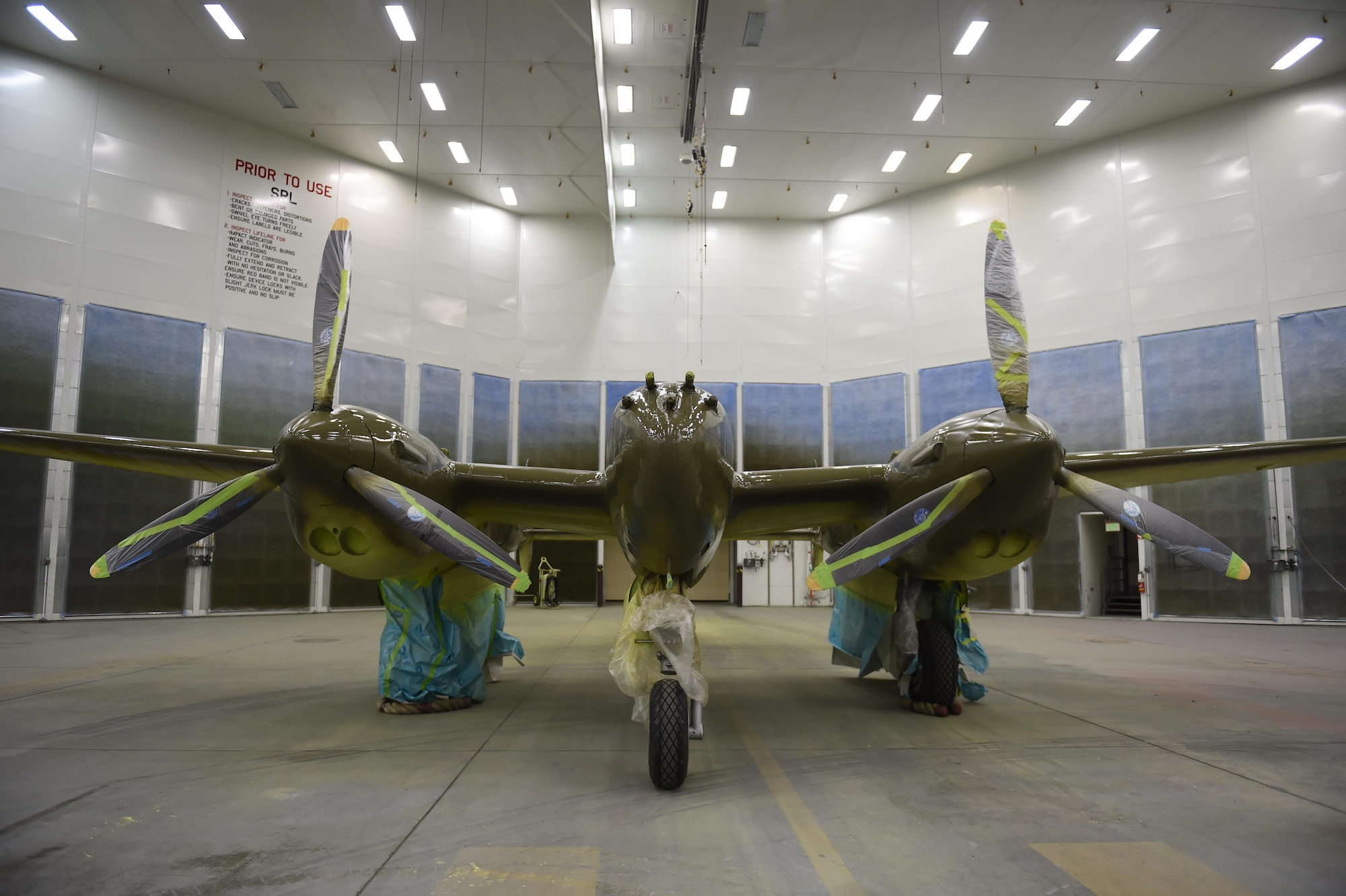 The P-38G Lightning sits inside Hangar 21 at Joint Base Elmendorf-Richardson, Alaska, July 20, 2017. The Lightning has been under restoration since August 2016. This particular P-38 saw action in World War II with the 54th Fighter Squadron in the Aleutians, where it crashed on Attu Island on Jan. 1, 1945. The P-38G Lightning is the only G model in existence and is one of fewer than 30 P-38s remaining in the world. 