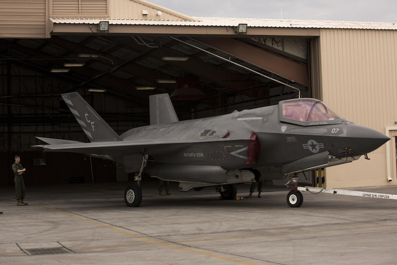 Marines with Marine Fighter Attack Squadron (VMFA) 211 “Wake Island Avengers,” 3rd Marine Aircraft Wing, tow an F-35B Lightning II into a hangar for maintenance at Nellis Air Force Base, Nev., July 10. A total of 10 aircraft and more than 250 Marines with VMFA 211 will participate in Red Flag 17-3, a realistic combat training exercise hosted by the U.S. Air Force to assess the squadron’s ability to deploy and support contingency operations using the F-35B. (U.S. Marine Corps photo by Sgt. Lillian Stephens/Released)