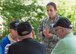 Hanscom Command Chief Master Sgt. Patricia L. Hickey speaks with veterans during a barbecue at the Lowell Veterans Community Care Center July 26. Hanscom volunteers prepared and served more than 120 meals and then met with 60 veterans as part of the daylong event. (U.S. Air Force photo by Mark Herlihy)