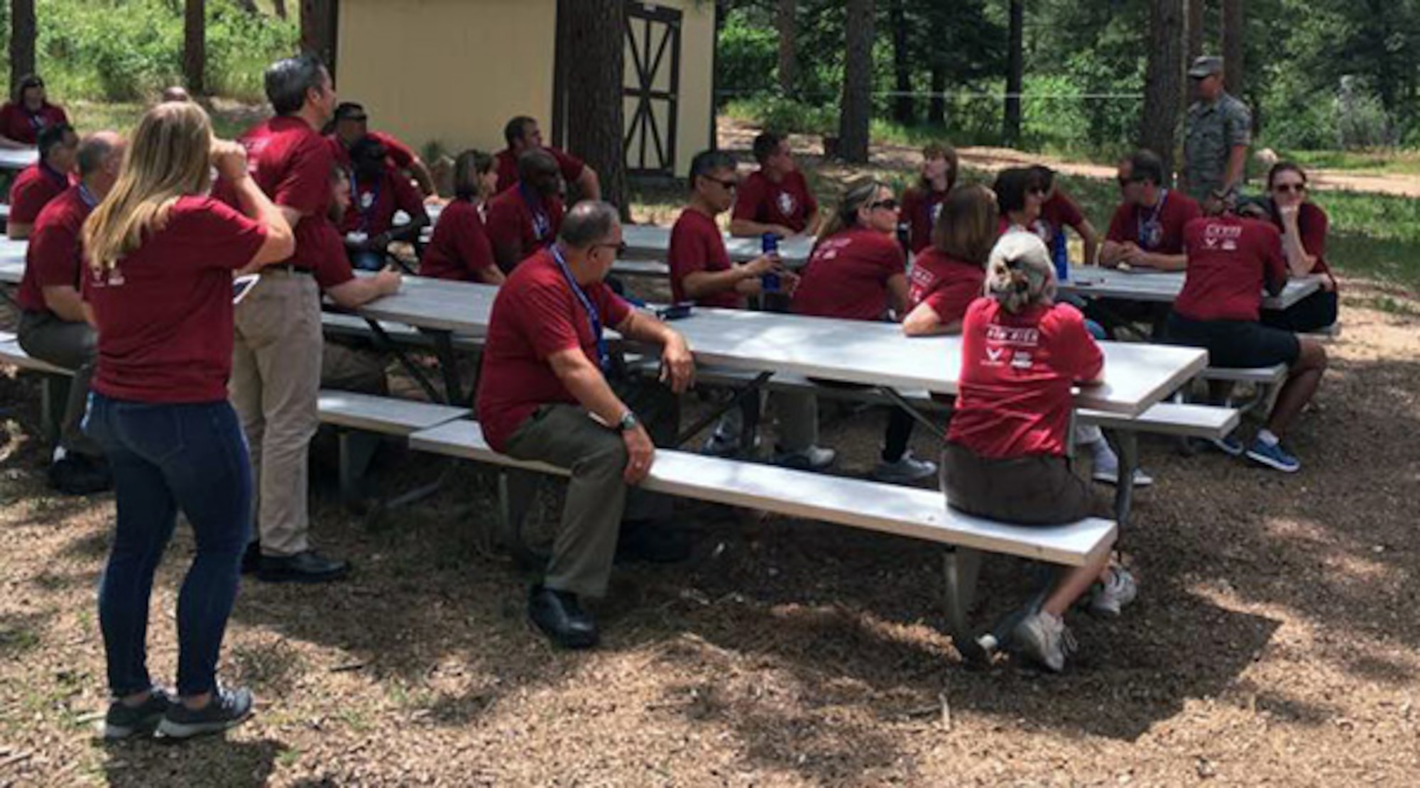 National educators take a break at the ropes course July 26 at the U.S. Air Force Academy. The teachers visited the Academy to attend the FIRST Leadership Experience. (U.S. Air Force photo/Laurie Wilson)