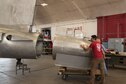 DAYTON, Ohio -- National Museum of the U.S. Air Force restoration crews install the tail turret (tail gunner position) on the B-17F Memphis Belle™ on July 26, 2017. This aircraft will be placed on public display here at the museum on May 17, 2018. (Photo courtesy Kevin Lush)