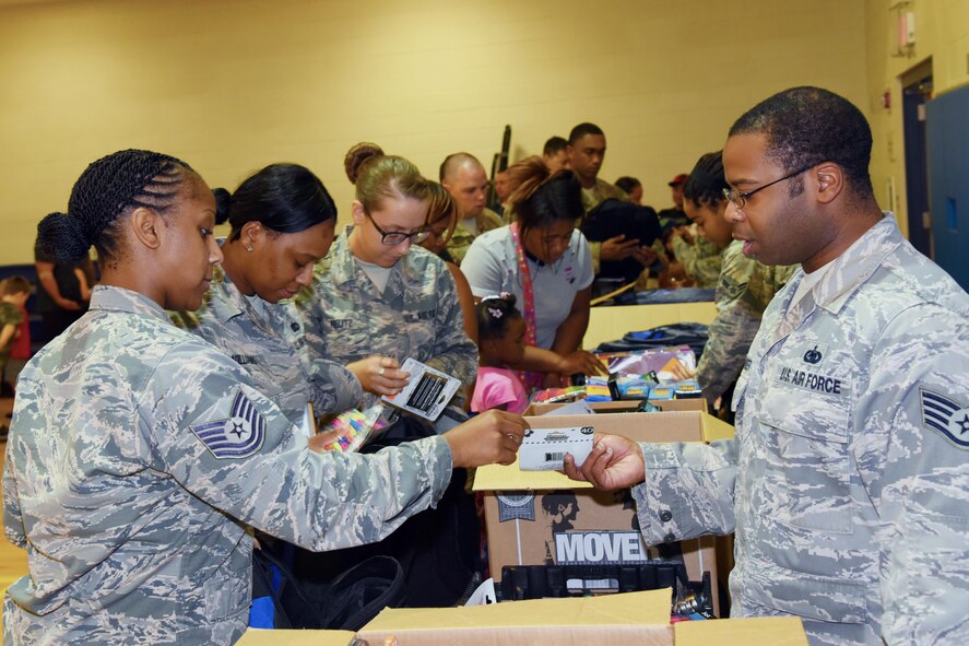 Airmen receive school supplies during the Back to School Brigade, July 26, 2017, Moody Air Force Base, Ga. The Airman and Family Readiness Center is scheduled to host another Back to School Brigade, August 16. (U.S Air Force photo by Airman Eugene Oliver)