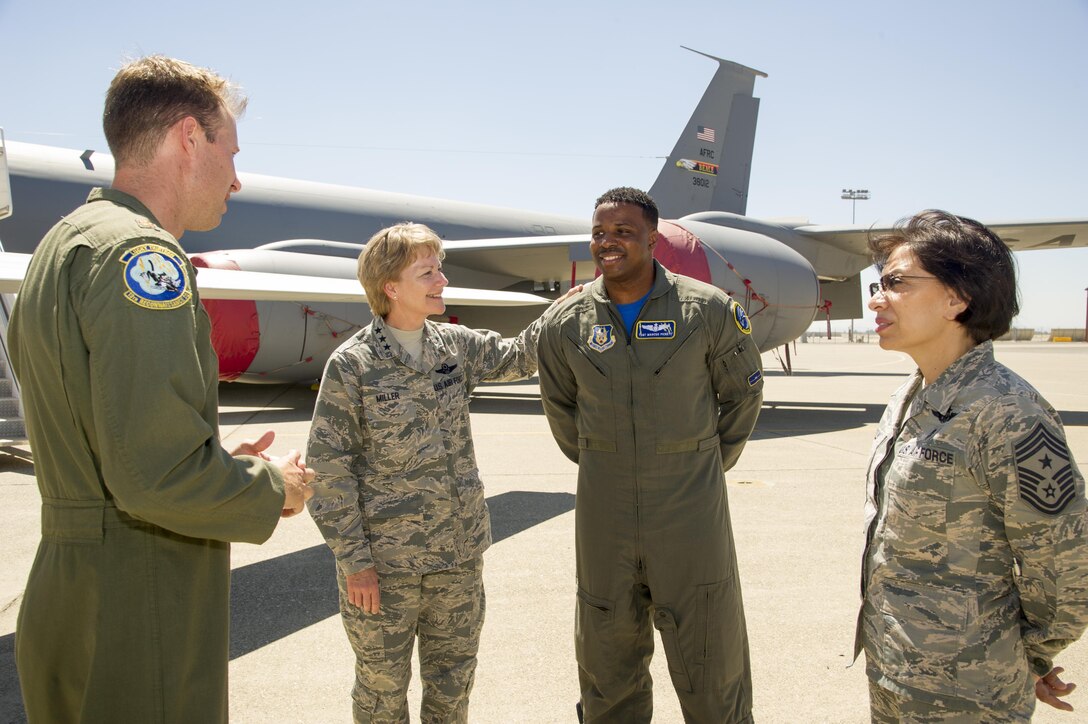 Lt. Gen. Maryanne Miller, Air Force Reserve Command commander and Chief of the Air Force Reserve, and Chief Master Sgt. Erika Kelly, AFRC command chief, speak with Airmen on the flightline July 15, 2017, at Beale Air Force Base, California. This was the senior leaders first visit to Beale as commander and command chief. (U.S. Air Force photo by Senior Airman Tara R. Abrahams)