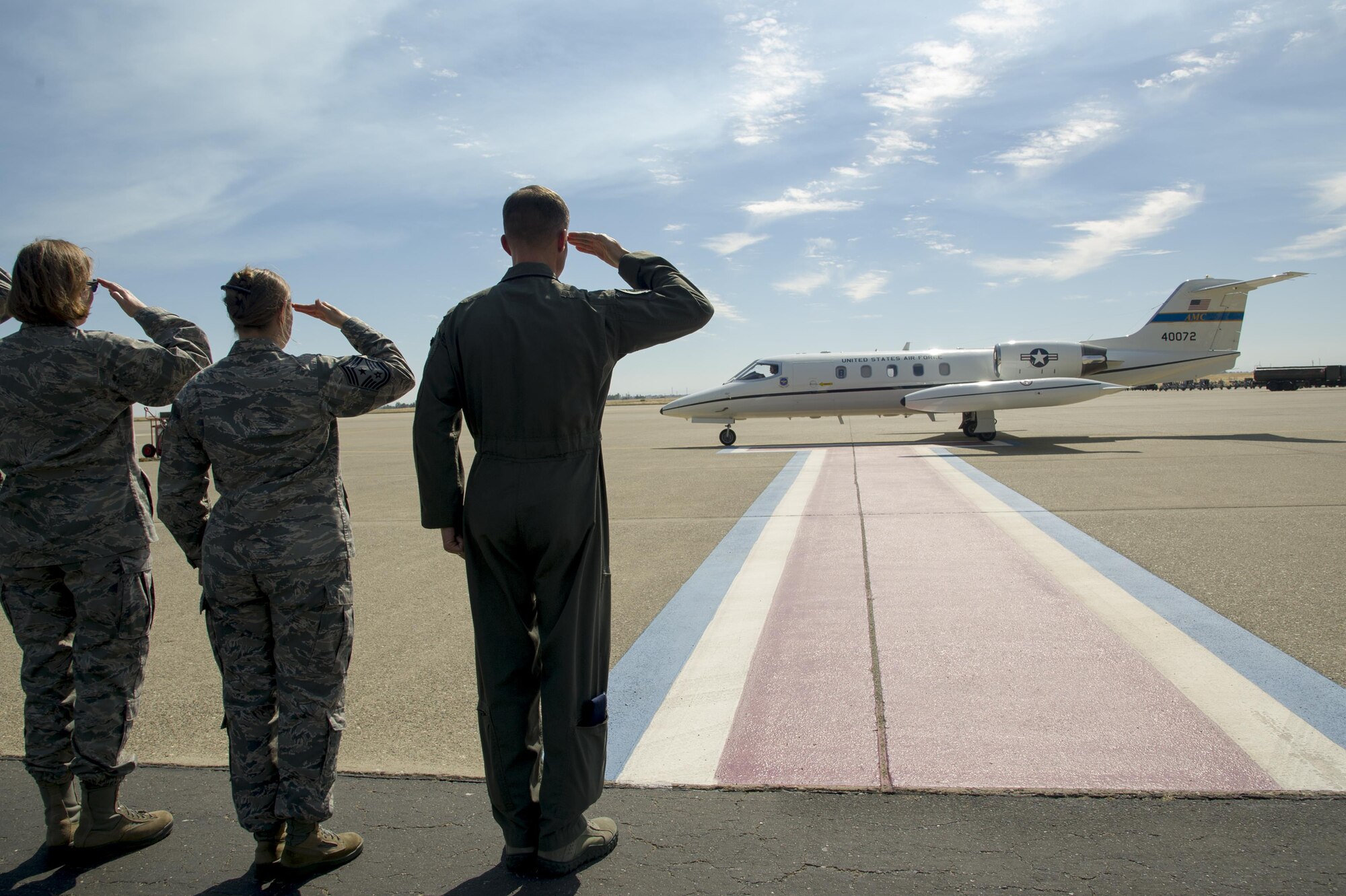 Beale Air Force Base senior leaders salute as the Air Force Reserve Command senior leaders arrive July 14, 2017, at Beale AFB, California. It was the first AFRC senior leader visit in seven years. (U.S. Air Force photo by Senior Airman Tara R. Abrahams)
