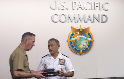 Marine Gen. Joseph F. Dunford Jr., chairman of the Joint Chiefs of Staff, meets with Navy Adm. Harry Harris, commander, U.S. Pacific Command before a trilateral meeting with Republic of Korea Army Gen. Lee Sun-Jin, Chairman of the ROK Joint Chiefs of Staff, Japan Maritime Self-Defense Force Adm. Katsutoshi Kawano, chief of staff of the Japan Self-Defense Force in Hawaii Feb. 10, 2016. The session, the second between the Defense Chiefs of the United States, Republic of Korea, and Japan since July 2014, featured discussions on trilateral information sharing and collaboration in light of the increasing North Korean nuclear and missile threats.