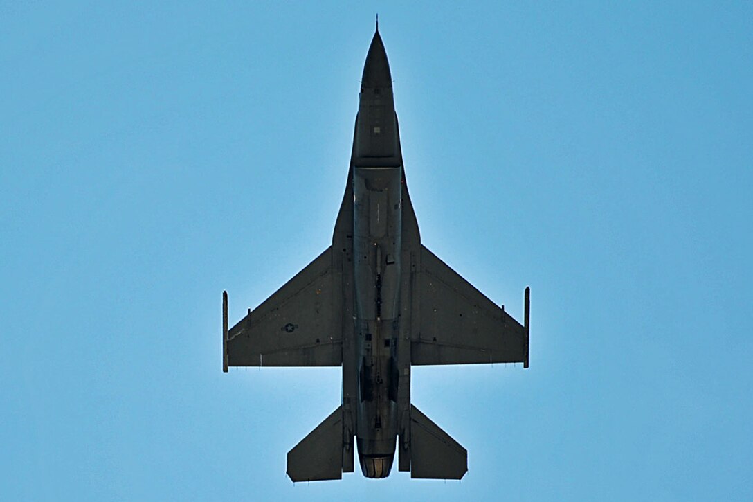 A U.S. Air Force F-16CM Fighting Falcon, piloted by Major John “Rain” Waters, Air Combat Command F-16 Viper Demonstration Team commander and pilot, performs an aerial practice at Shaw Air Force Base, S.C., July 28, 2017. The team performs precision aerial maneuvers to demonstrate the combat capabilities of one of the U.S. Air Force's premier multi-role fighters, the F-16 Fighting Falcon. (U.S. Air Force photo by Senior Airman Christopher Maldonado)
