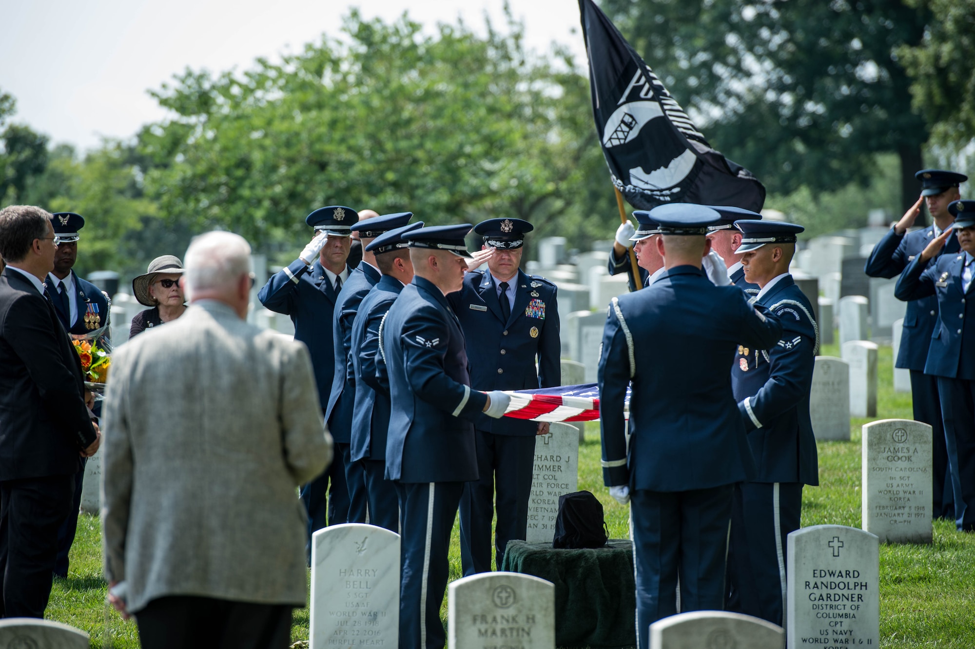 Air Force Ceremonial Guardsmen fire a volley during retired Air Force Col. Freeman Bruce Olmstead’s funeral at Arlington National Cemetery, Arlington, Va., July 27, 2017. For his actions as a Prisoner of War, Olmstead received Silver Star, Distinguished Flying Cross and Purple Heart. (U.S. Photo/Andy Morataya)