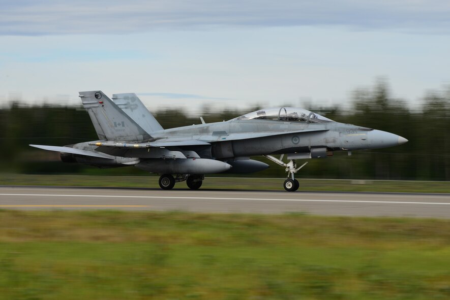 A Royal Canadian Air Force CF-18 Hornet aircraft assigned to the 409th Tactical Fighter Squadron, Canadian Forces Base Cold Lake, Alberta, takes off from the Eielson Air Force Base, Alaska, runway Aug. 15, 2016, during RED FLAG-Alaska 16-3. RED FLAG-Alaska is focused on improving the combat readiness of U.S. and international forces and developing and improving joint and combined interoperability. It is conducted on the Joint Pacific Alaska Range Complex (JPARC) with air operations flown primarily out of Eielson Air Force Base and Joint Base Elmendorf-Richardson, Alaska. (U.S. Air Force photo/Airman 1st Class Cassandra Whitman)