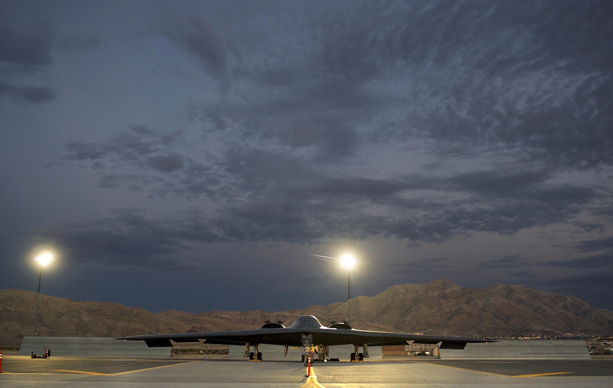 Aircraft maintainers assigned to the 509th Aircraft Maintenance Squadron, Whiteman Air Force Base, MO., perform pre-flight checks on a B-2 Spirit bomber from the 393rd Bomb Squadron prior to a Red Flag 17-3 training sortie July 20, 2017 at Nellis AFB, Nev. Red Flag exercises commonly task aircraft to fly multiple sorties per day, which requires maintenance to be performed throughout the night. (U.S. Air Force photo by Senior Airman Kevin Tanenbaum) 

