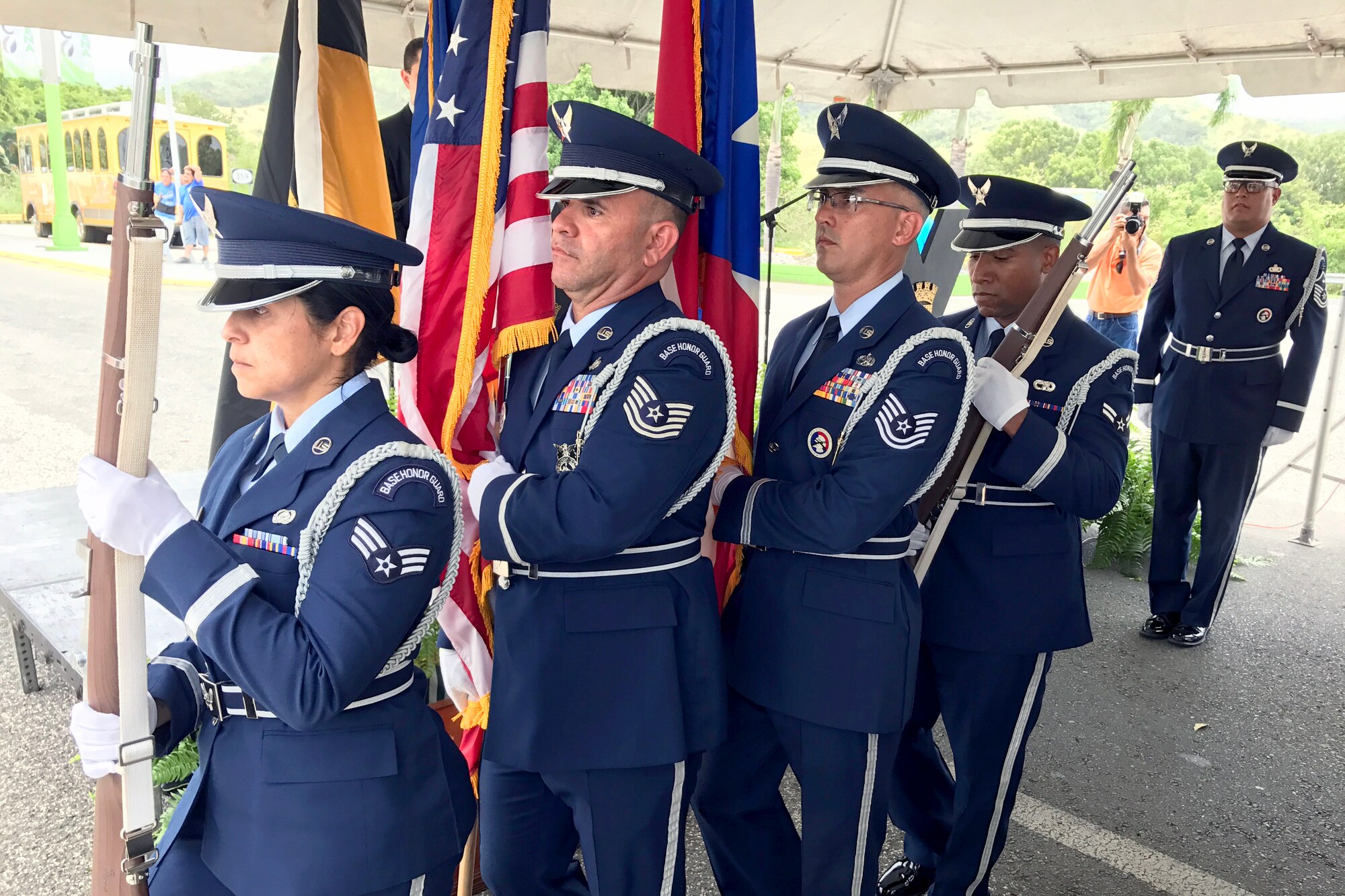 U.S. Airmen of the 156th Airlift Wing honor guard detail render military honors during Brig. Gen. Mihiel Gilormini's posthumous street naming ceremony held in Yauco, Puerto Rico, July 15. (U.S. Air National Guard photo by Staff Sgt. Mizraim Gonzalez/Released)