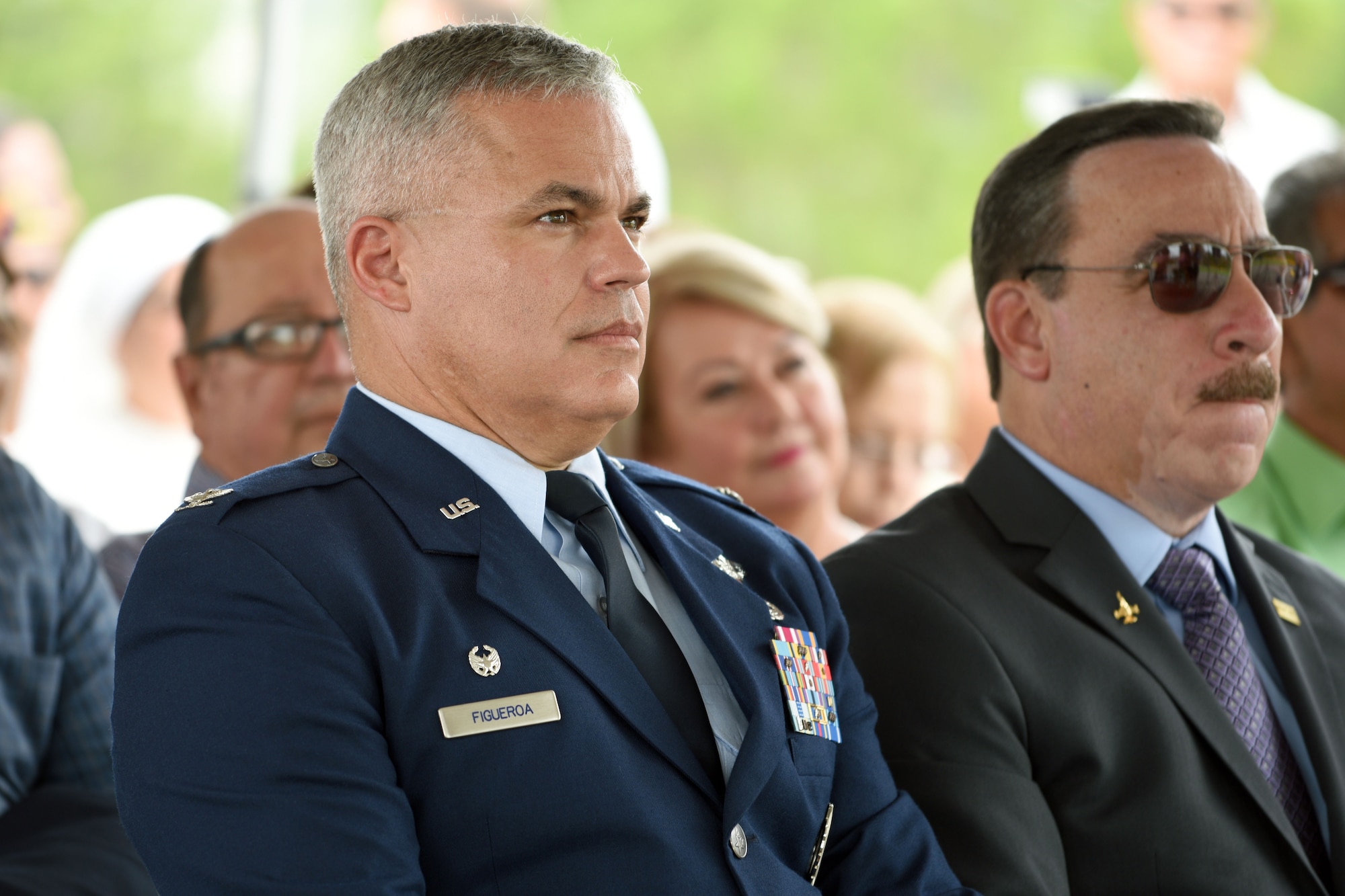 U.S. Air Force Col. Raymond Figueroa, 156th Airlift Wing commander, and retired Col. Carlos Quiñones participate in Brig. Gen. Mihiel Gilormini's posthumous street naming ceremony held in Yauco, Puerto Rico, July 15.