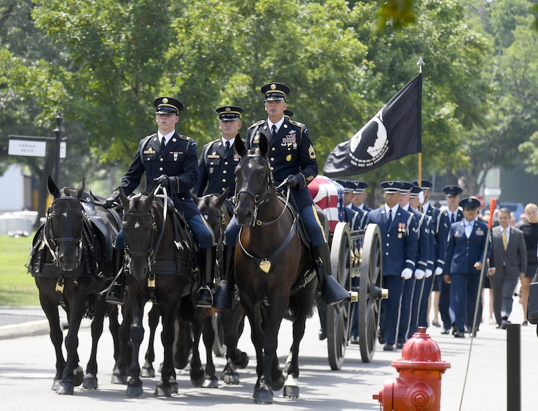 Service members render full honors for retired Col. Freeman Bruce Olmstead’s funeral at Arlington National Cemetery, Arlington, Va. July 27, 2017. Olmstead, an Air Force veteran and prisoner of war survivor, passed away Oct. 14, 2017.  (US Air Force Photo/Andy Morataya)