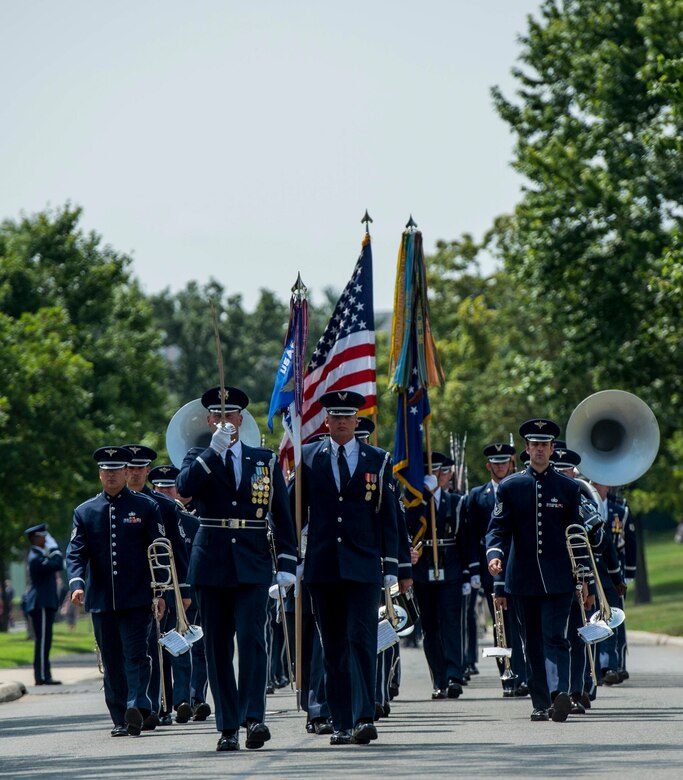 Service members render full honors for retired Col. Freeman Bruce Olmstead’s funeral at Arlington National Cemetery, Arlington, Va. July 27, 2017. Olmstead, an Air Force veteran and prisoner of war survivor, passed away Oct. 14, 2017.  (US Air Force Photo/Andy Morataya)